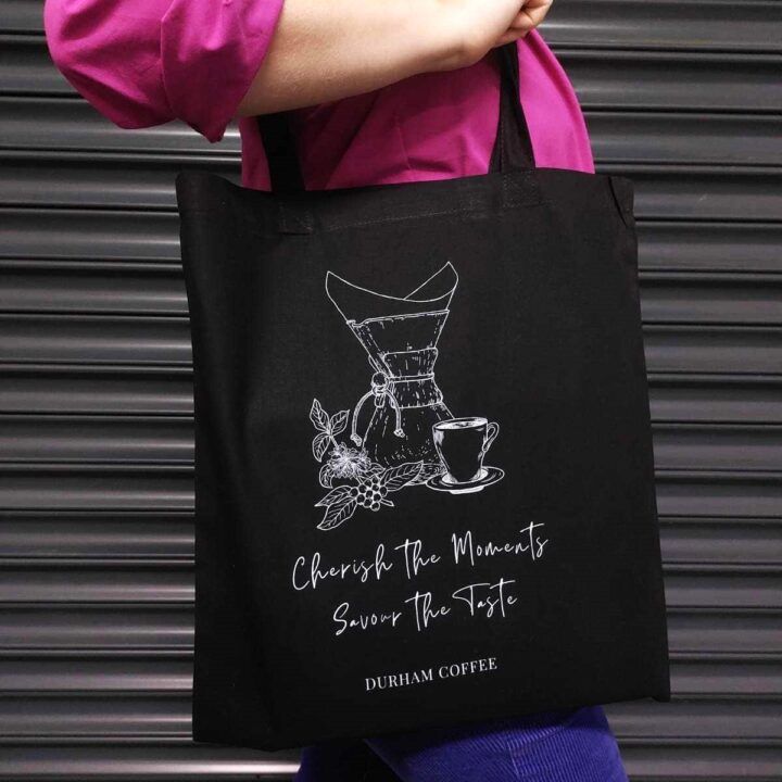 A black tote bag from Durham Coffee Roasters.