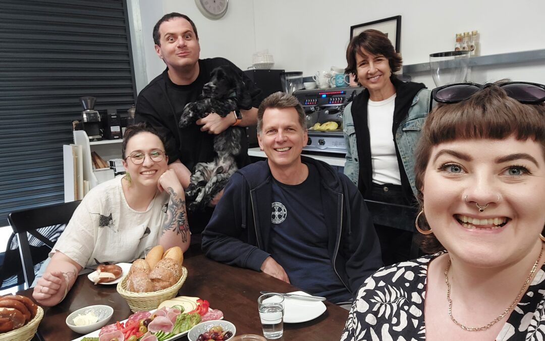 A selfie of the Durham Coffee team alongside the team from Mio Coffee who came to visit them at the coffee roastery in Durham